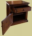 Carved linenfold bedside cupboard open