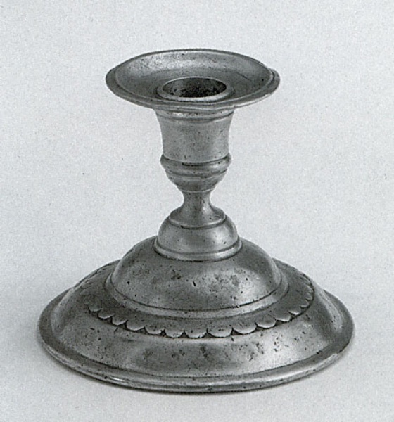 Traditional pewter candle holder