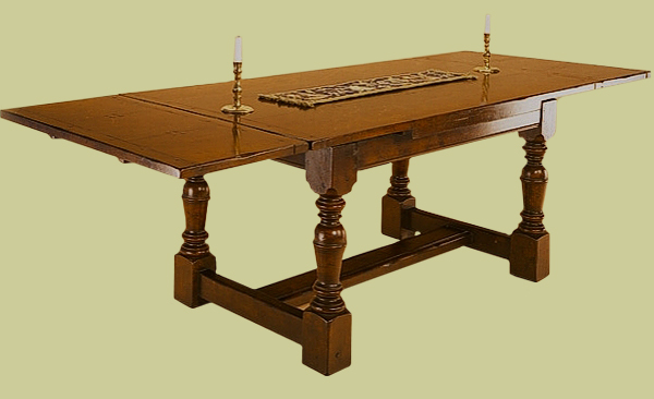 Oak extending table with leaves out.