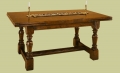 Oak extending table that will seat between 6 and 10 people.