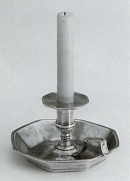 Traditional pewter candle holder