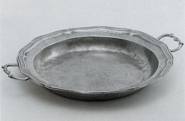Traditional pewter dish with handles