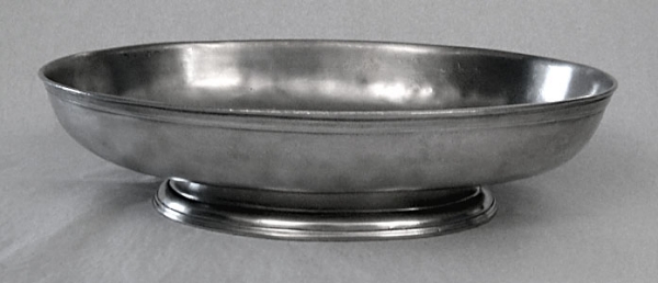 Traditional pewter oval dish with handle
