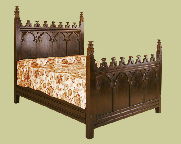 Gothic style carved bed in oak.