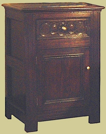 Bedside cupboard with hand carved drawer