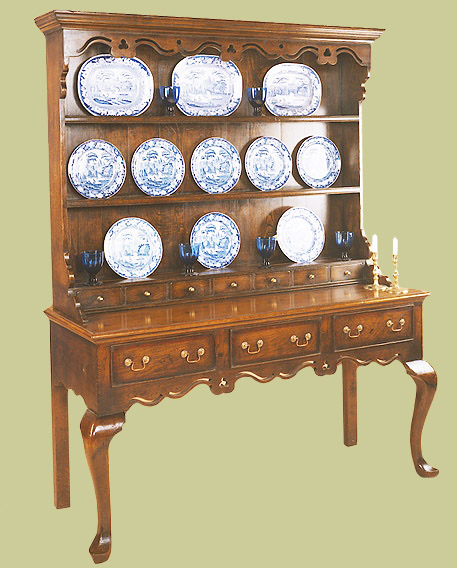 High oak cabriole leg dresser with some lovely period features.