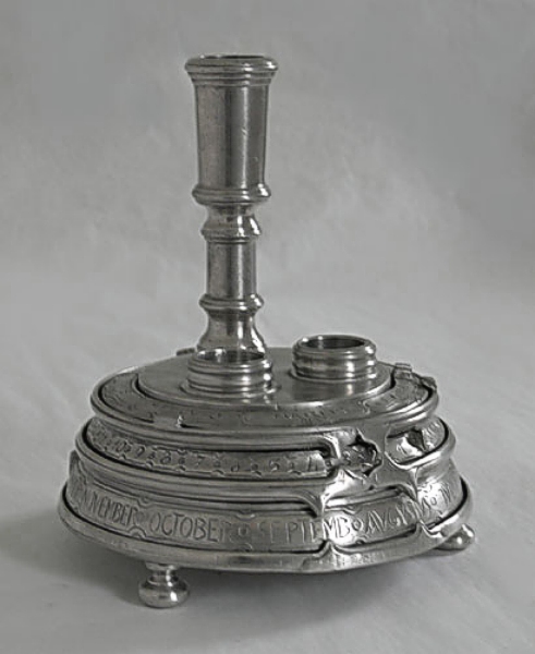 Traditional pewter table calendar