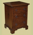 Oak bedside drawers in period style.