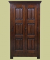 Oak wardrobe, with hand carved 16th century style linenfold panelled doors - front.