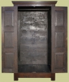 Oak wardrobe, with hand carved 16th century style linenfold panelled doors - interior.