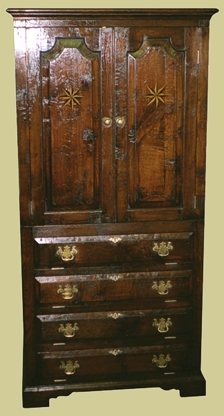 Linen press oak quadrant panelled