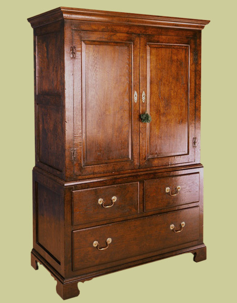 Linen press, handmade and hand finished solid oak, with 2 doors and 3 drawers.