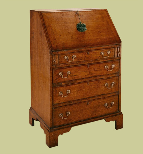 Antique style oak bureau shown closed.