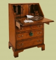 Antique style oak bureau, shown here open.
