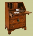 Change main image to Antique style oak bureau, shown here open. Antique style oak bureau, shown here open.