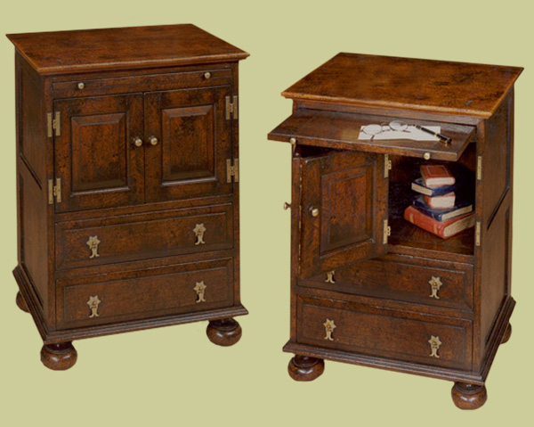 Traditional oak bedside cabinet, with top cupboard, 2 drawers and pull out shelf.