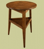 Oak cricket table with circular top & useful middle shelf