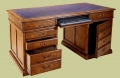 Oak pedestal desk, handmade in Britain, open showing storage.