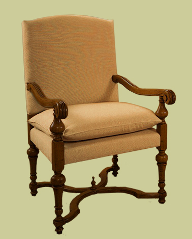 18/19th century style upholstered oak armchair, with carved scrolled arms and 