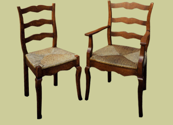 Provence style cabriole leg ladderback side chairs and armchairs, with drop in rush seats.