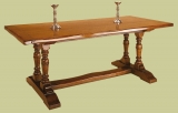 Oak dining table with paired pedestal supports