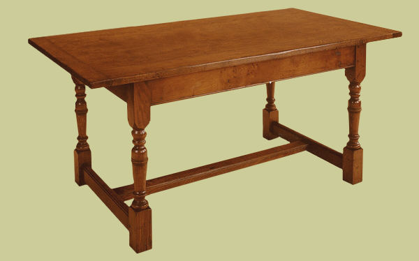 Light form refectory oak dining table in a 17th century style.