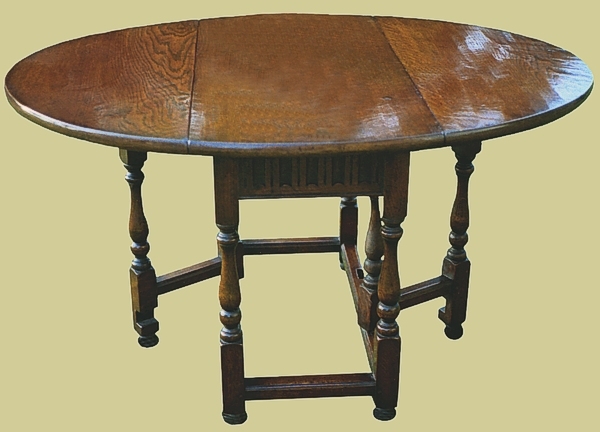 Gateleg dining table carved