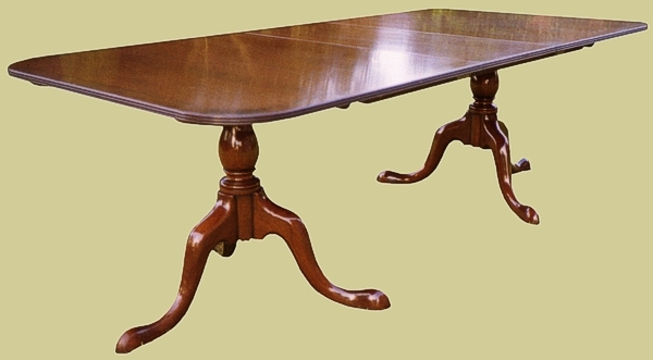 Extending pedestal dining table