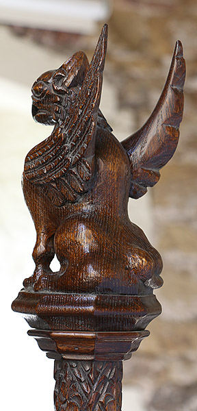 Rear view of Gothic oak carved griffin