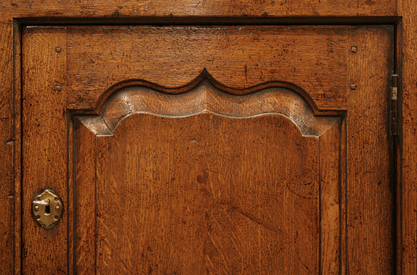 Ogee panelled oak TV cabinet door