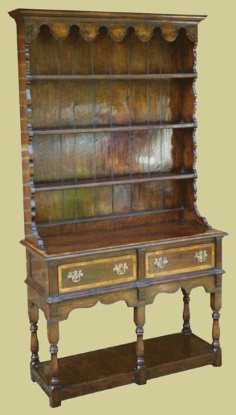 Small Montgomeryshire oak dresser with potboard base