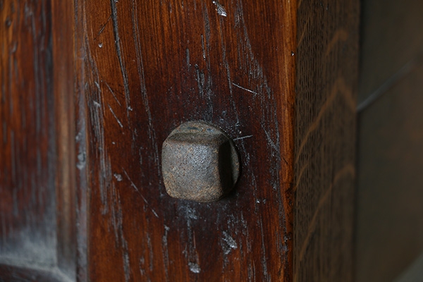 Gothic style oak bed fixing bolt detail