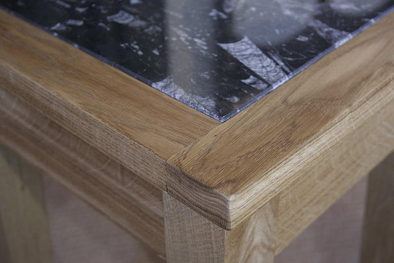 Detail of contemporary natural oak lamp stand