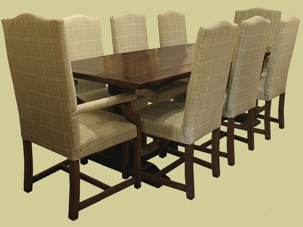 Period style oak pedestal table and fully upholstered side chairs