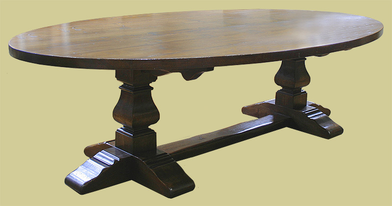 Large oval oak pedestal dining table with square cut legs