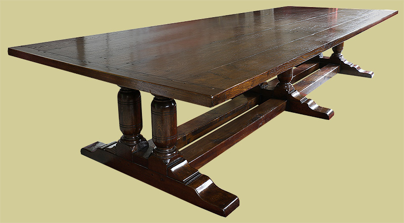 Large oak pedestal dining table, with paired marrow leg supports