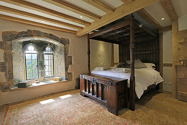 15th century style oak chest and 4-poster bed, in clients English country manor house