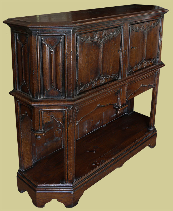 Medieval style carved oak livery cupboard
