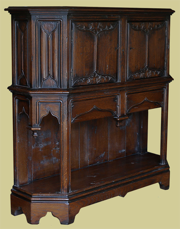16th century style oak canted carved livery cupboard