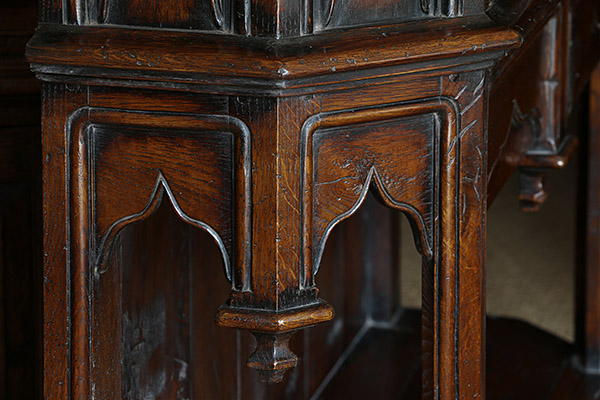 Ogee panel detail on 16th century style oak livery cupboard