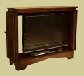 Oak TV cabinet Gothic style with bi-fold doors open.
