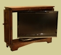 Oak TV cabinet Gothic style with TV extended for viewing.