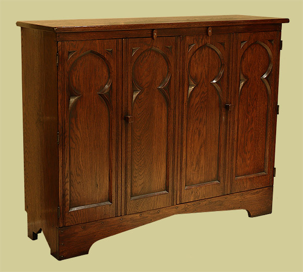 Gothic style oak TV cabinet