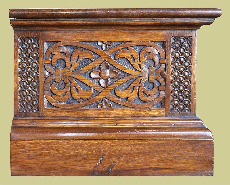 Oak TV stand with hand carved Elizabethan style strapwork carved end panels
