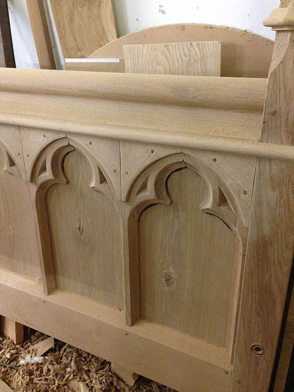 Tracery oak footboard panels in the making