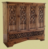 Hand carved oak tracery TV cabinet in Flamboyant style