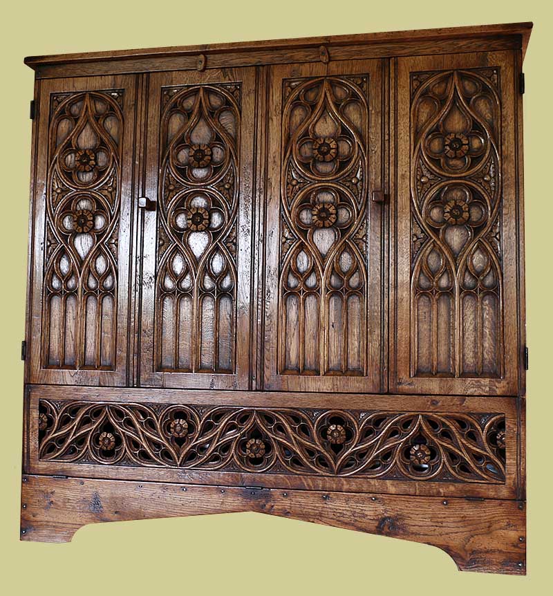 Period style carved oak tracery TV cabinet