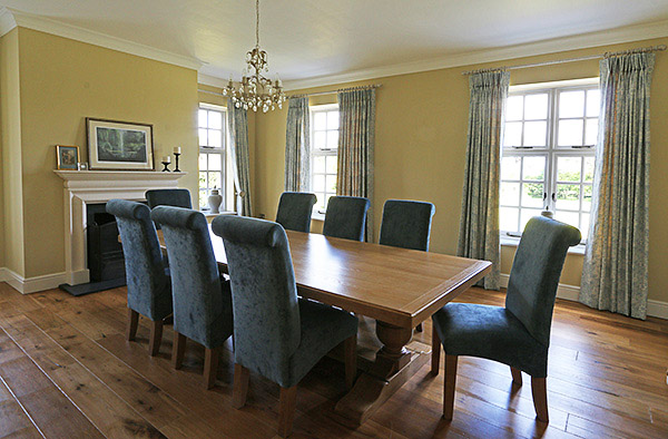 Modern style upholstered oak chairs compliment our traditional style oak pedestal dining table
