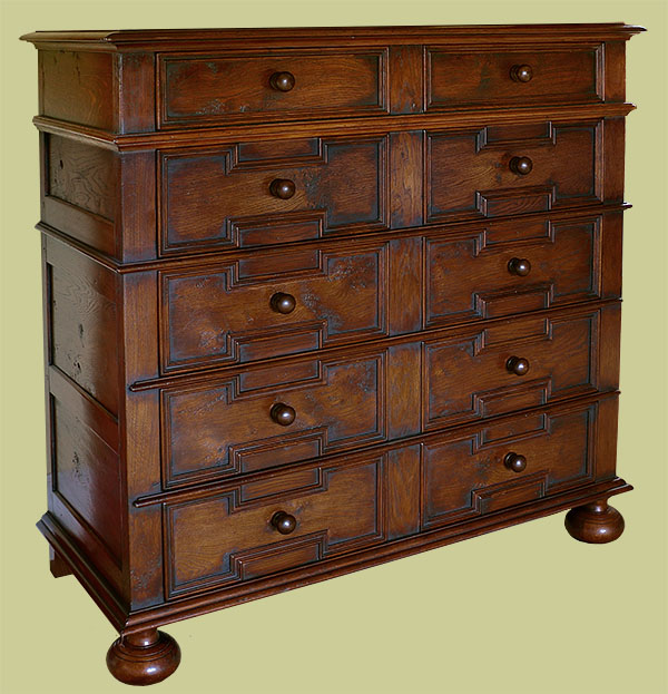 Jacobean style oak chest of drawers, with modern ball bearing runners.