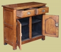 Bespoke period style 2-drawer, 2-door oak dresser base, shown with drawers and doors open.